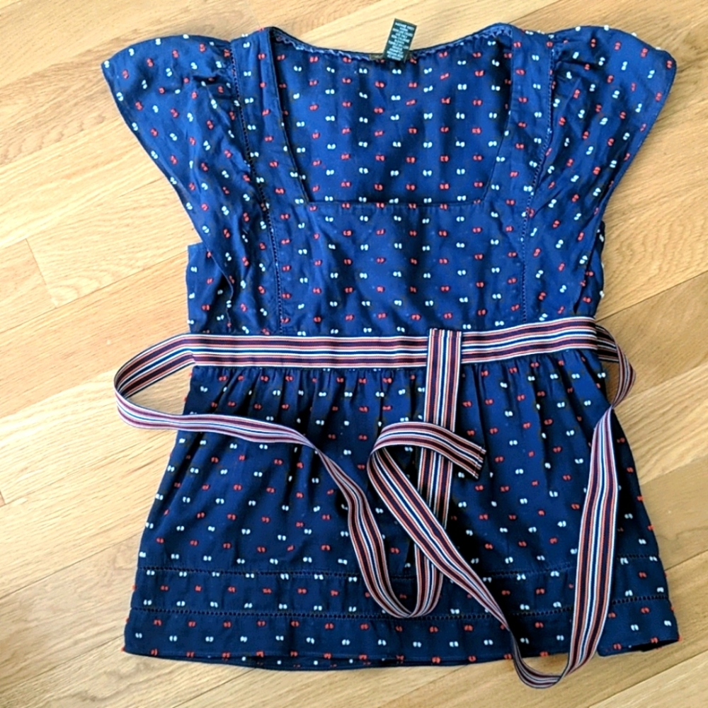 Blue, orange and white top